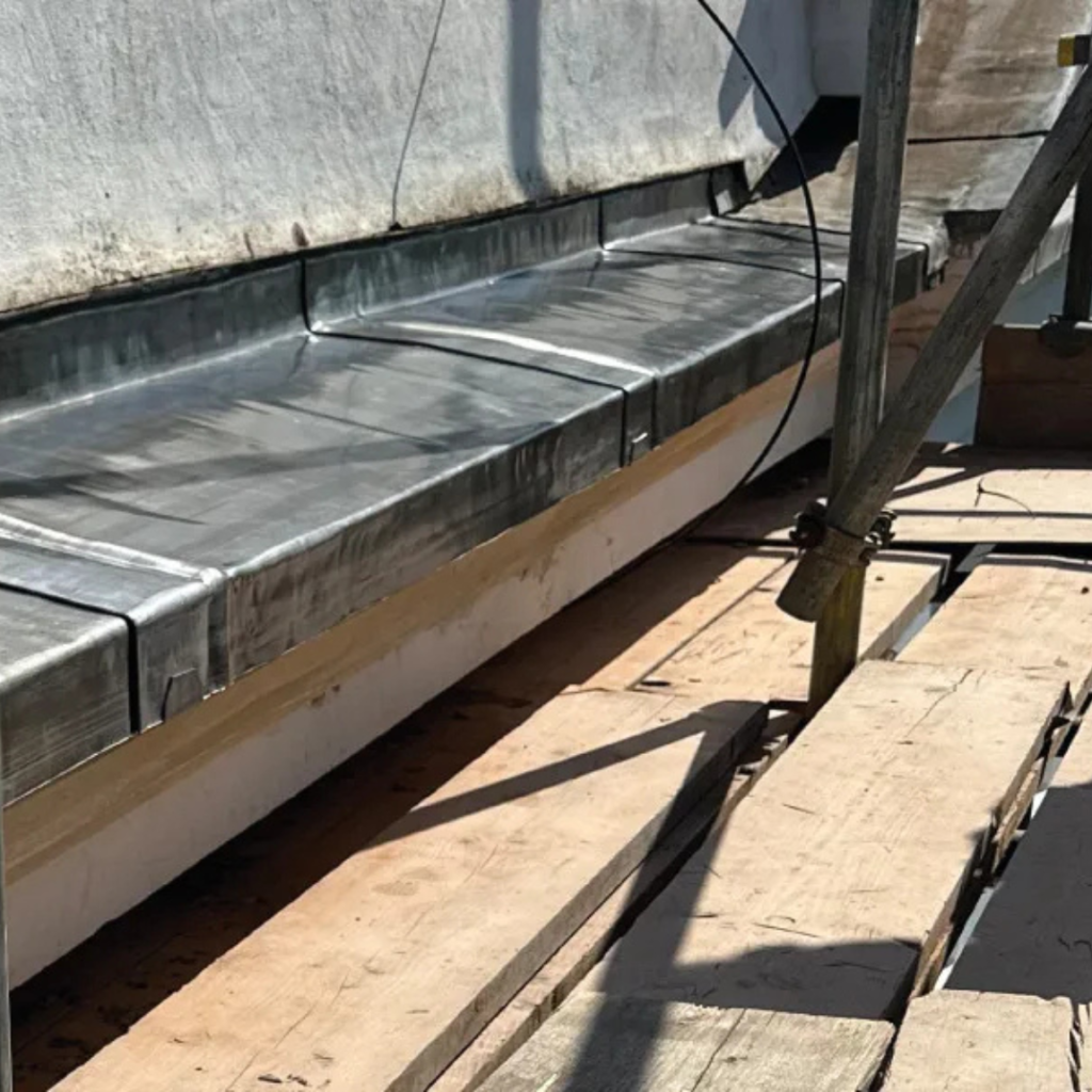 repairing flashing on a commercial roof